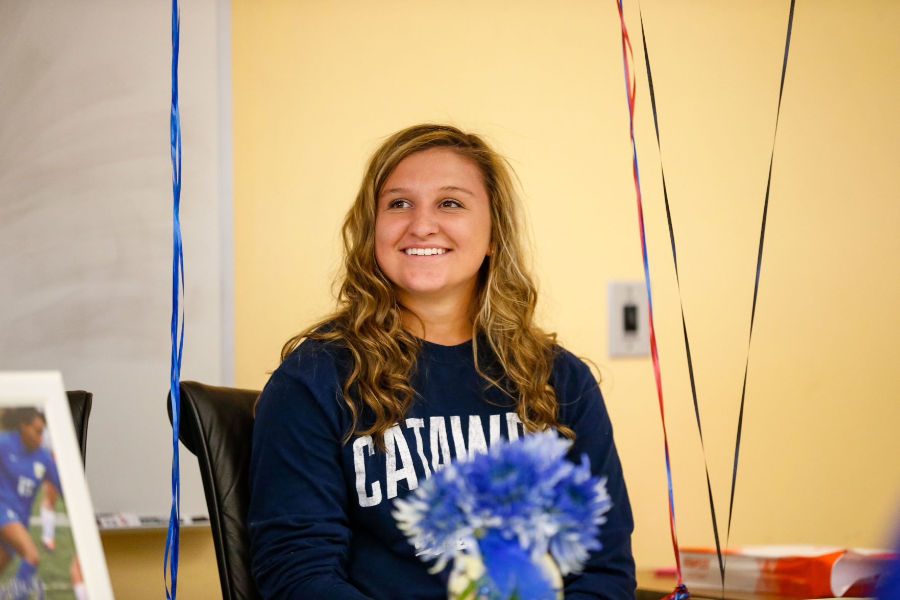 SIGNING DAY: Rampart athletes sign their National Letter of Intent